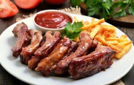 Занимательная кулинария: Свиные ребрышки в томатном соусе